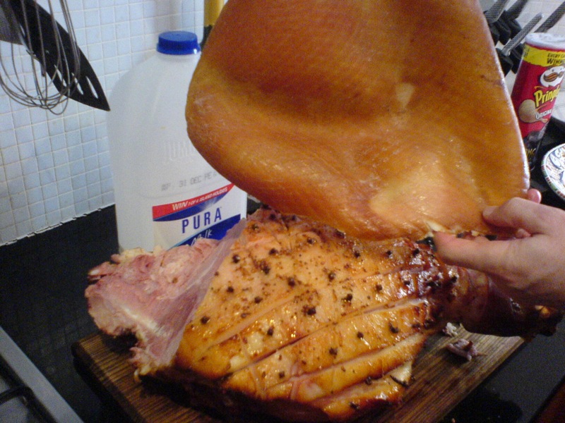 a person  meat on a wooden board