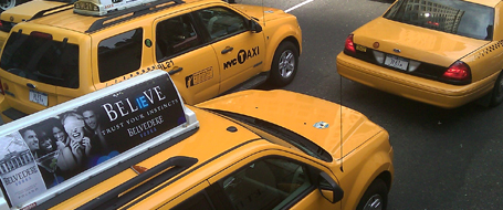 taxis are on a street in the usa