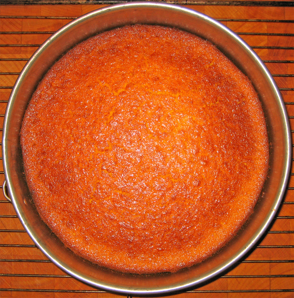a round brown pan filled with cooked food