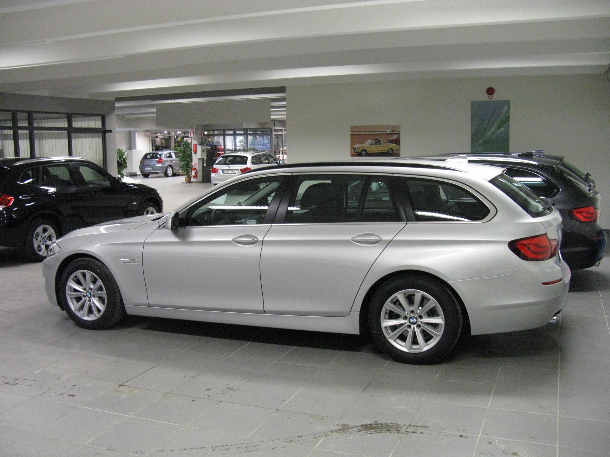 an open bmw store with the door partially closed