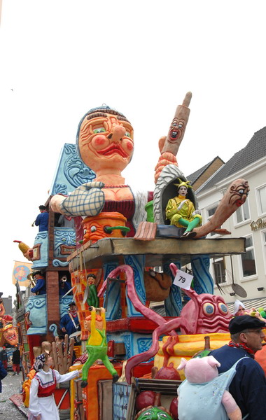 a very colorful float in a street parade
