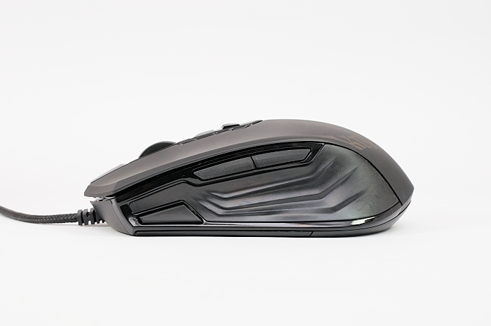 a white and black computer mouse sitting on top of a table