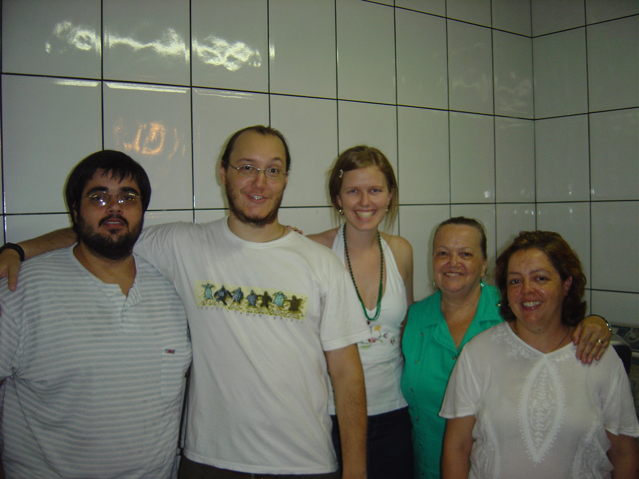 a group of people standing next to each other