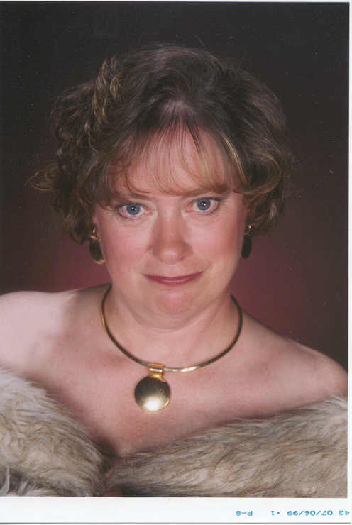 a women wearing a necklace in front of a po