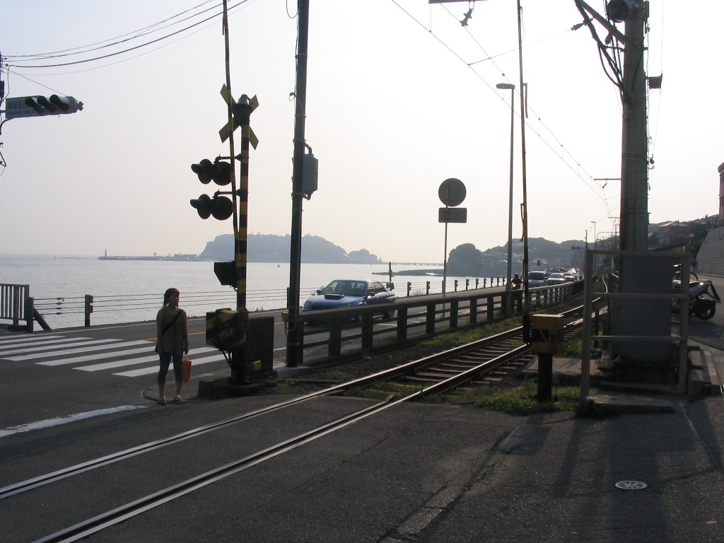 a person with a skateboard on a train track