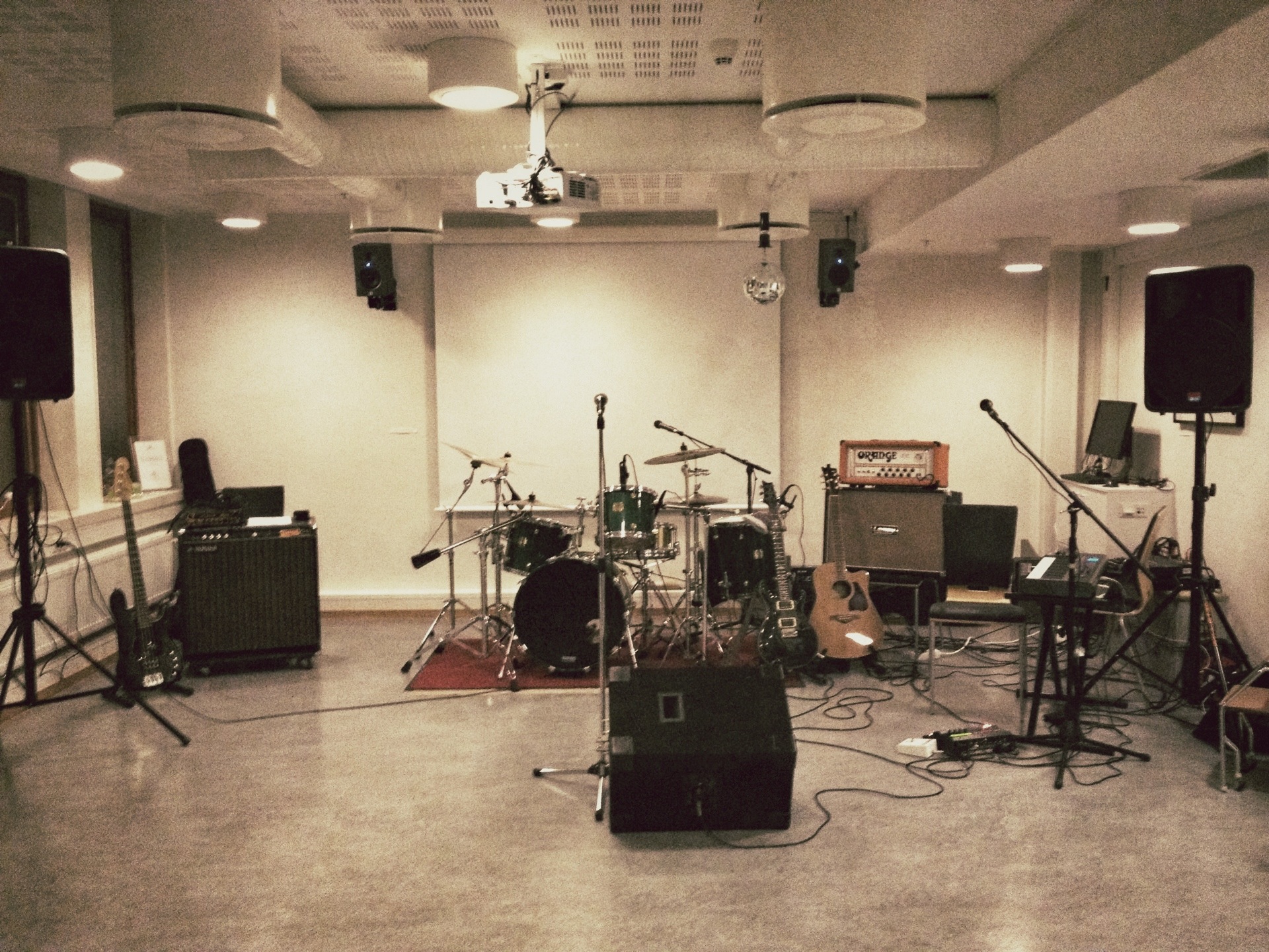 the empty, studio is a place with a lot of musical instruments and sound equipment
