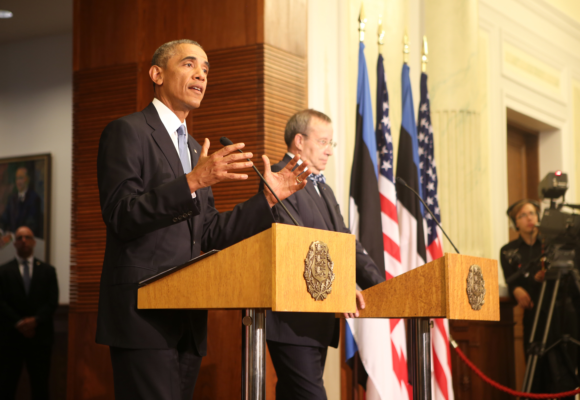 a speaker is speaking at a news conference