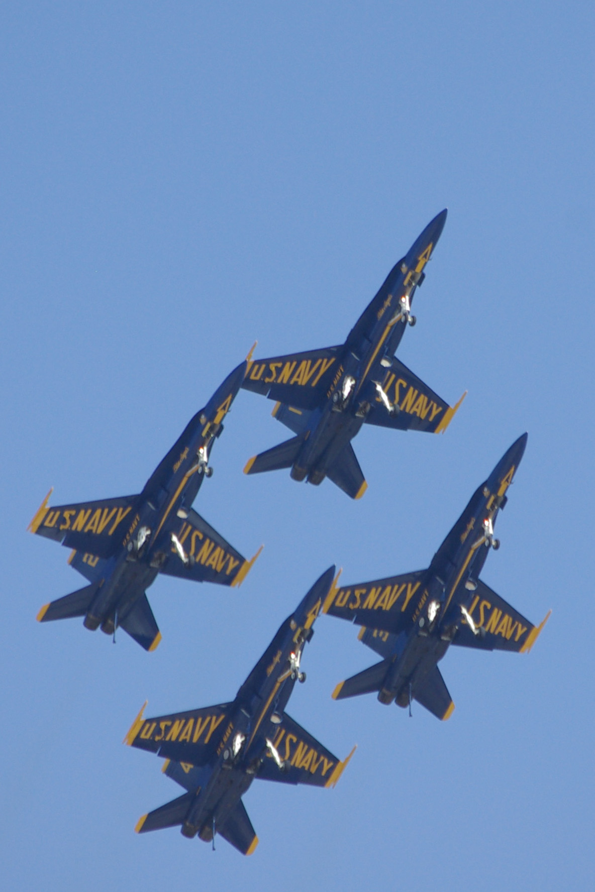 several jets fly together in an upward pattern