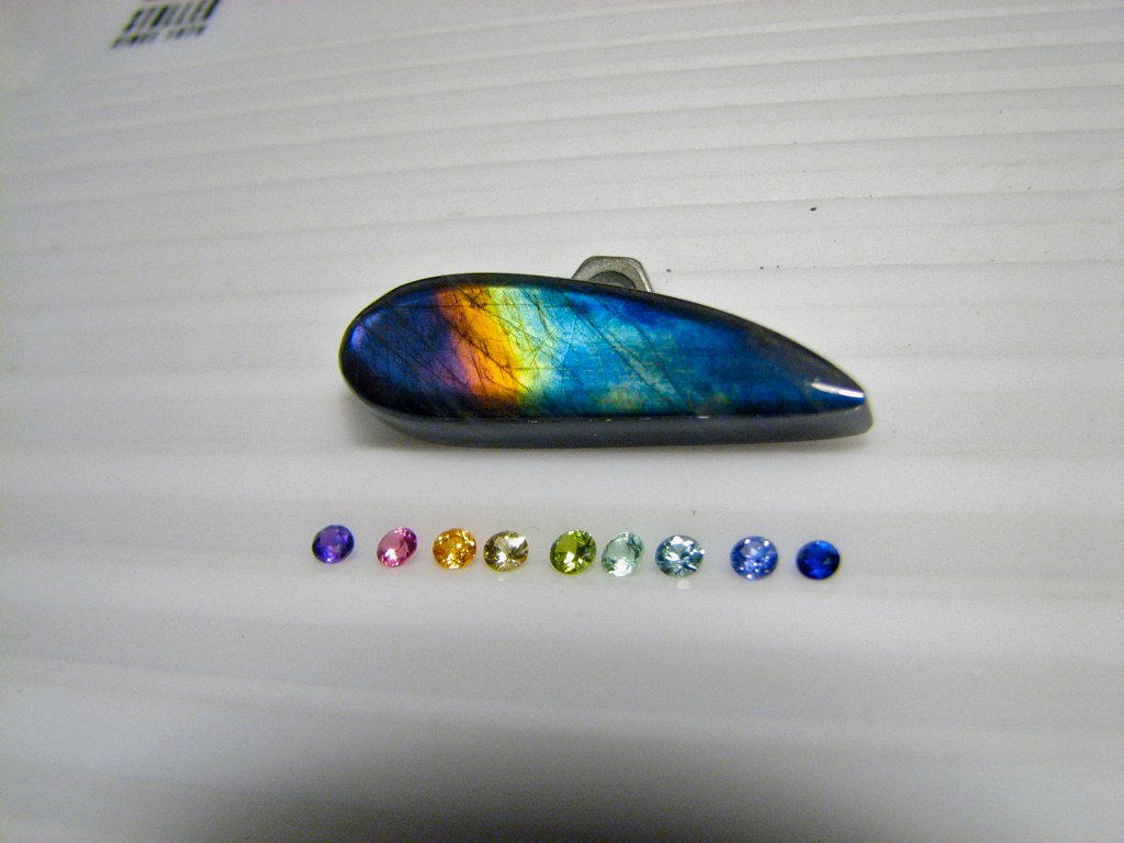 a metal case that has several different stones