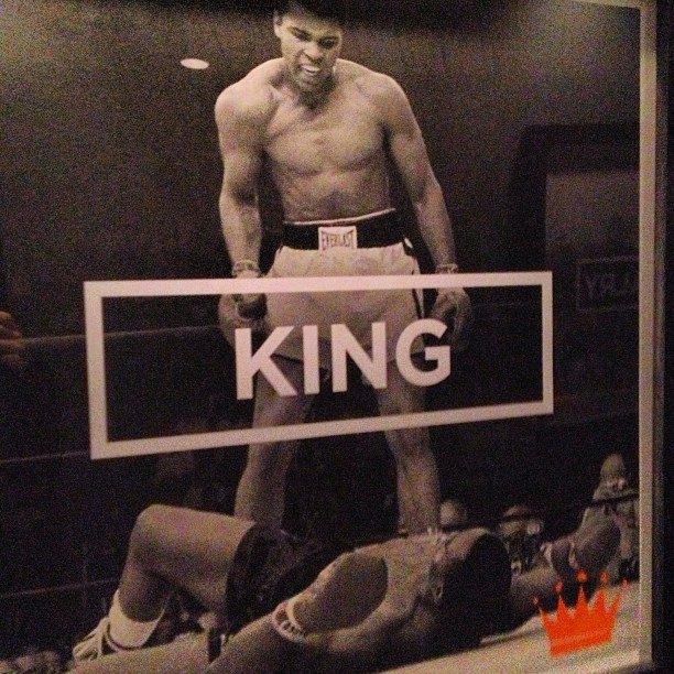 a po of a shirtless man with an image of him as king of boxers