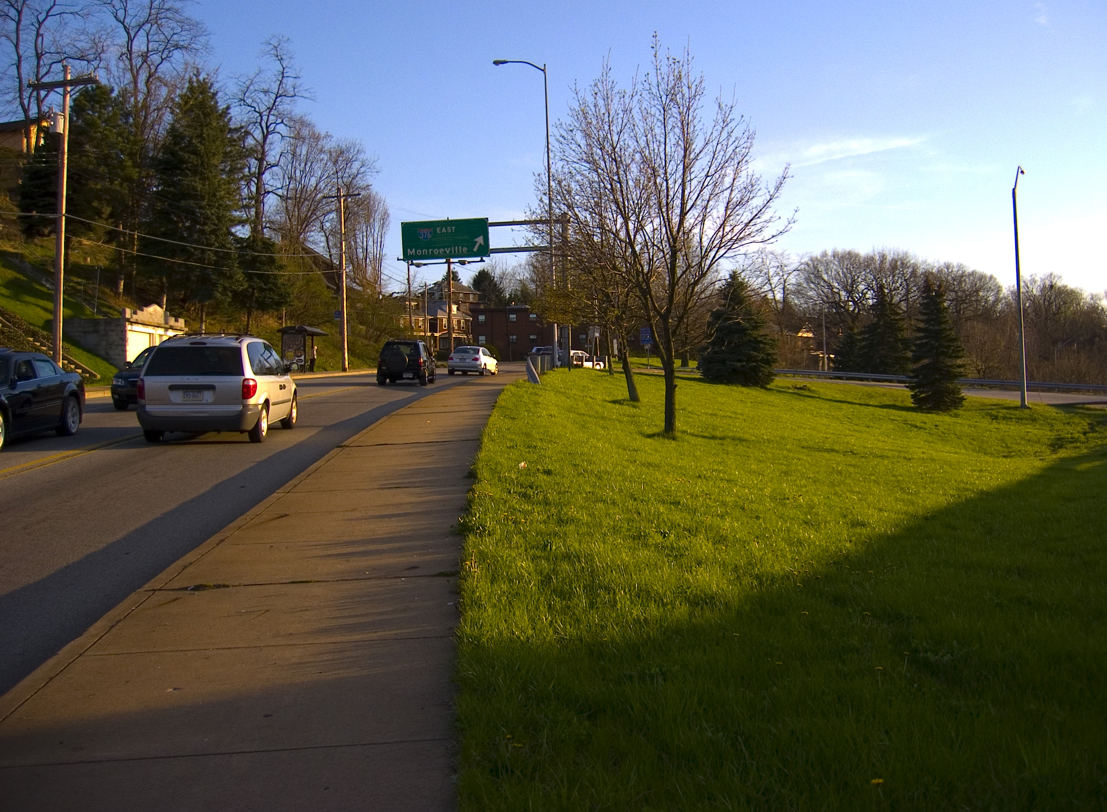 an image of cars driving down a street