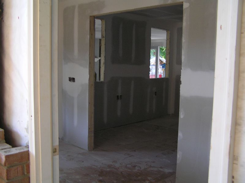 a view from the doorway of a room being built