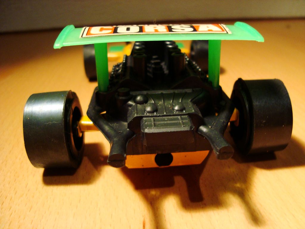 a toy vehicle is seen here on top of the table
