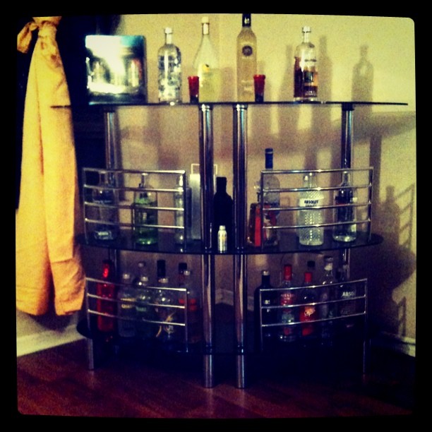 there is a wine rack with bottles on it