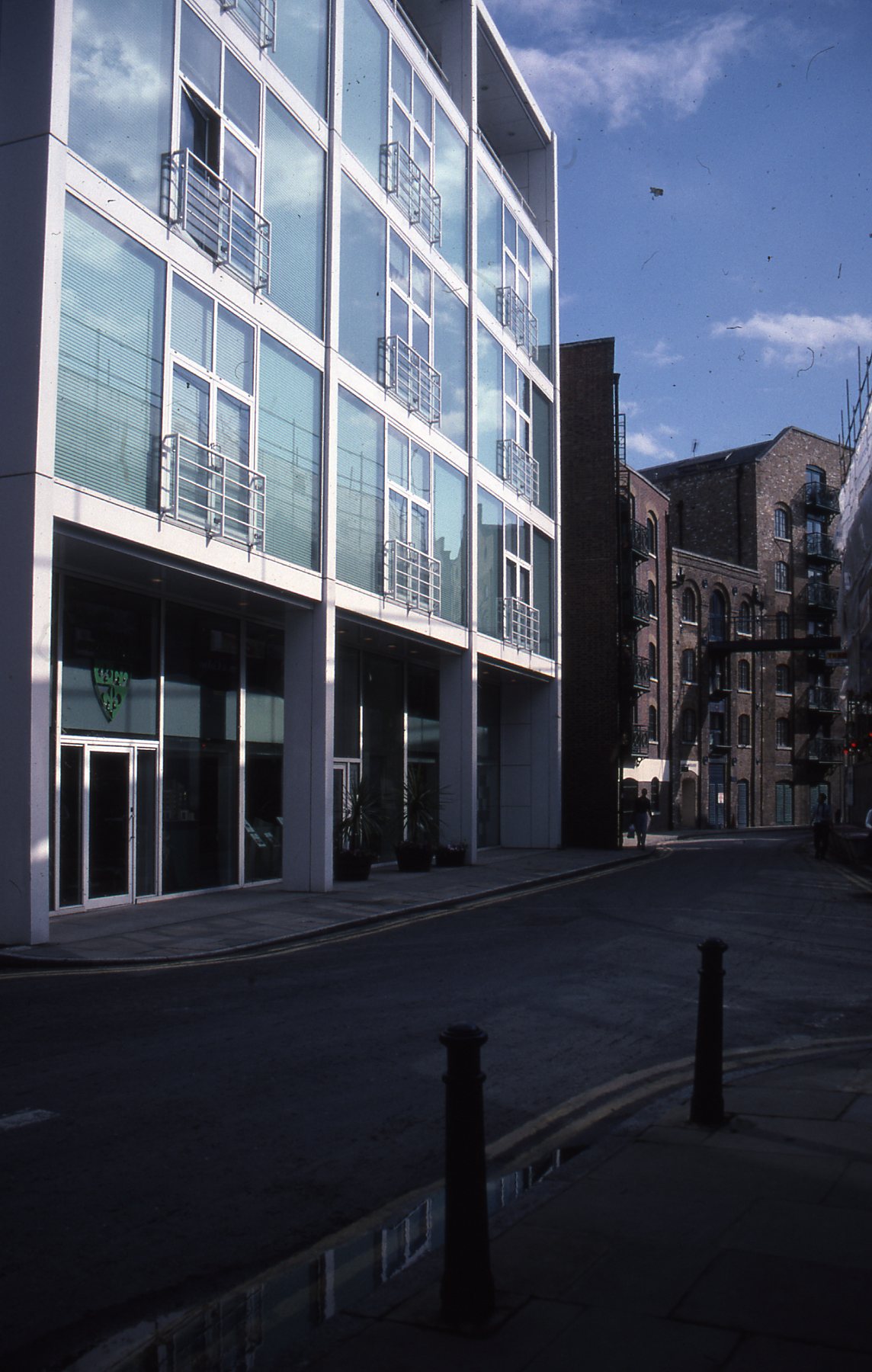 there is an empty building with glass doors on the front