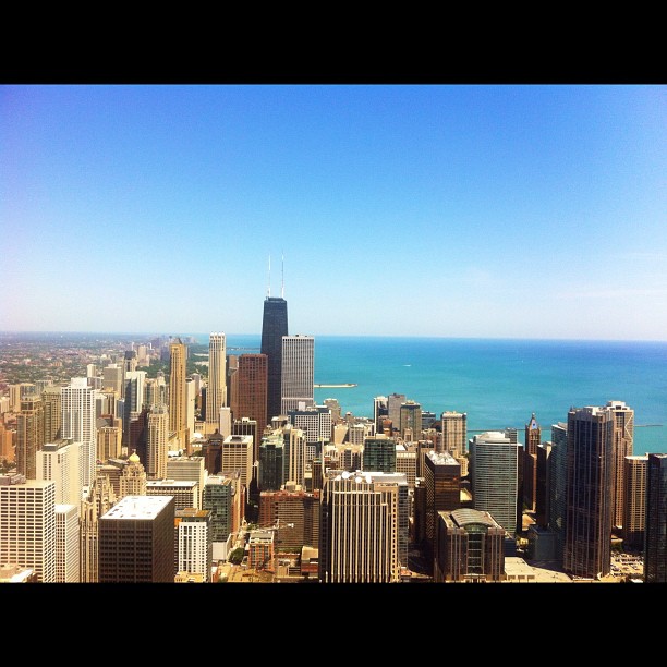 a beautiful view of the chicago skyline with a blue sky