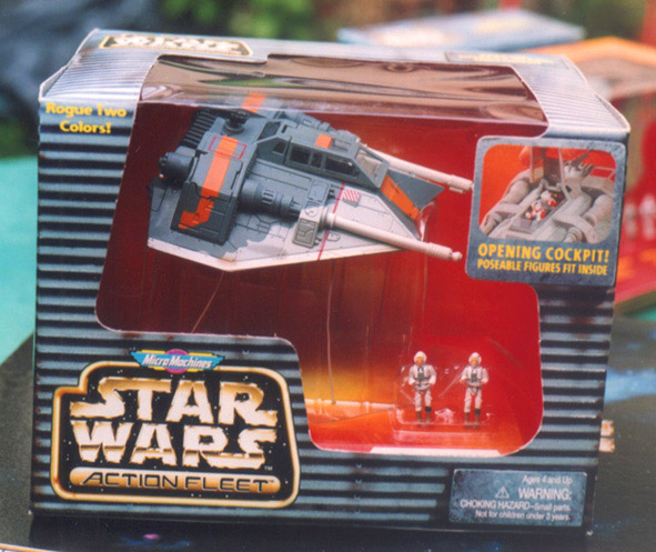star wars action figures on display with a boxed case