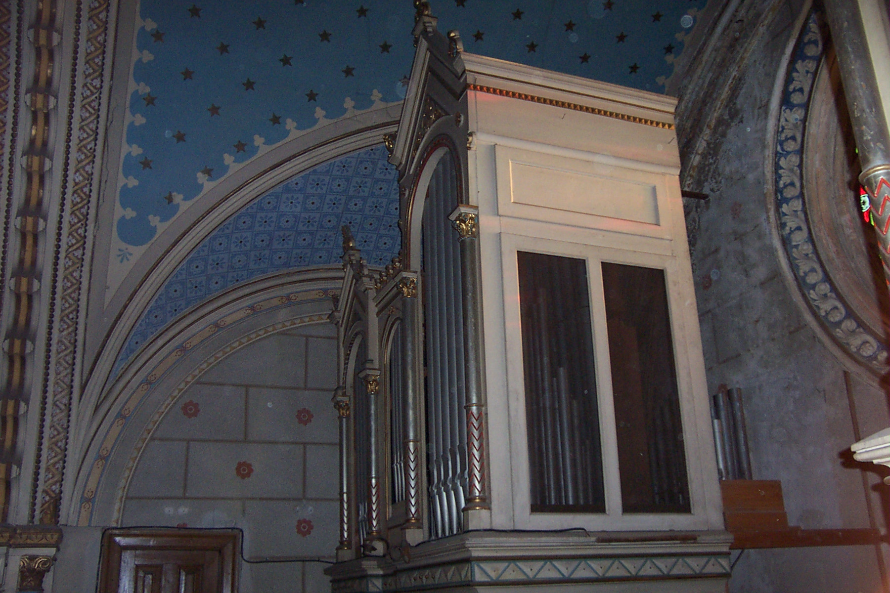 an intricately decorated room with a large window