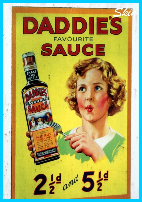 a vintage ad for dapplie's sauce with a girl pointing to a bottle
