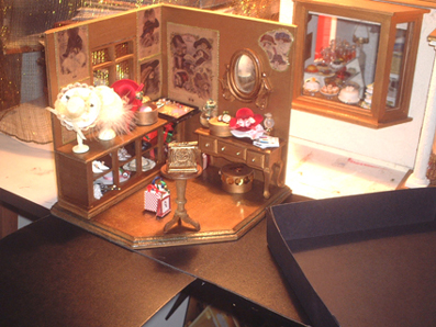 a wooden dolls house that has been opened