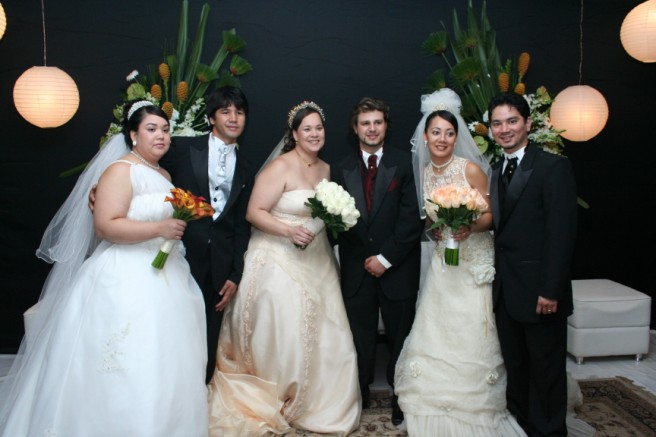 the wedding party is posing for the camera