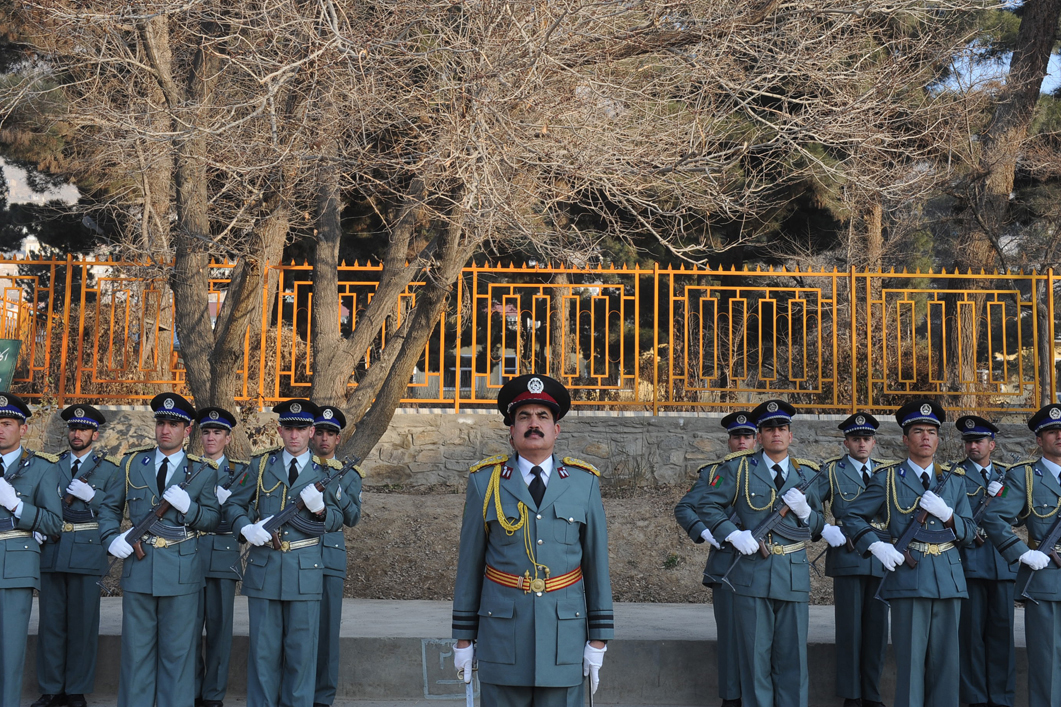 a bunch of men are dressed in uniforms and ties