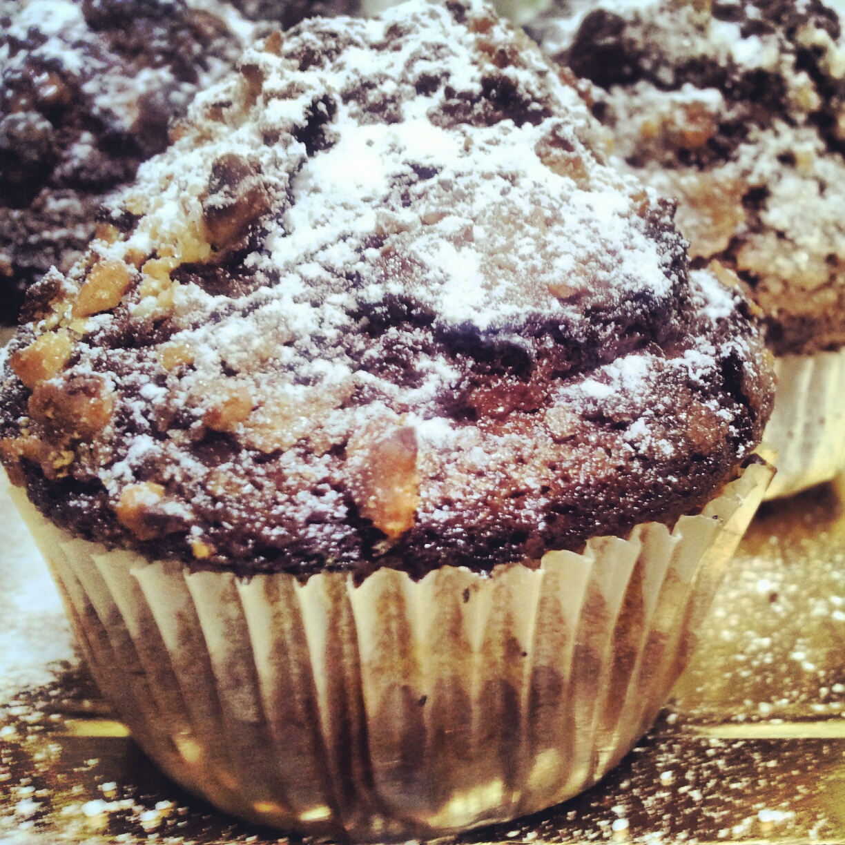 a close up view of a crumbded muffin