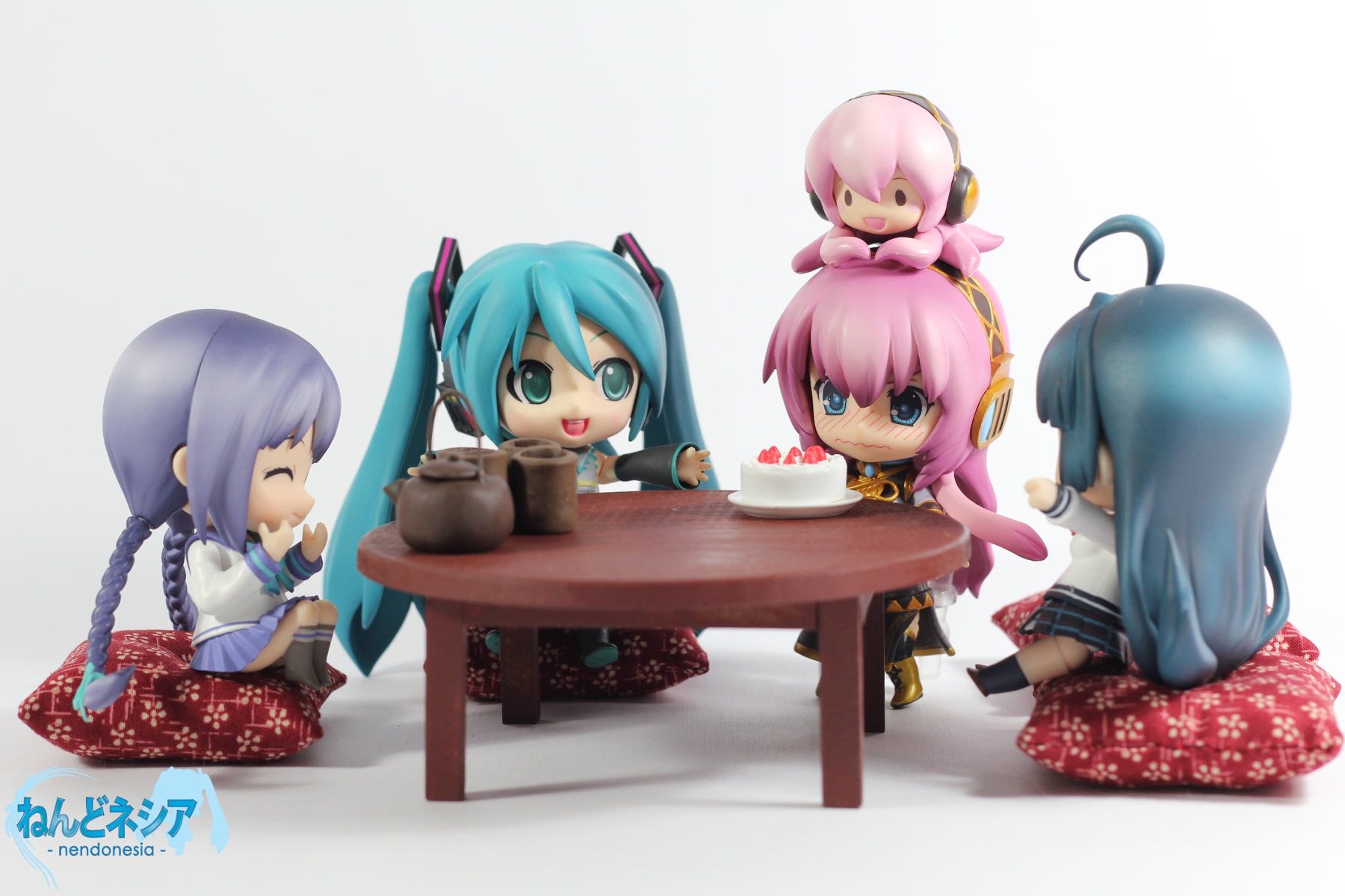 an image of a group of figurines sitting around a table