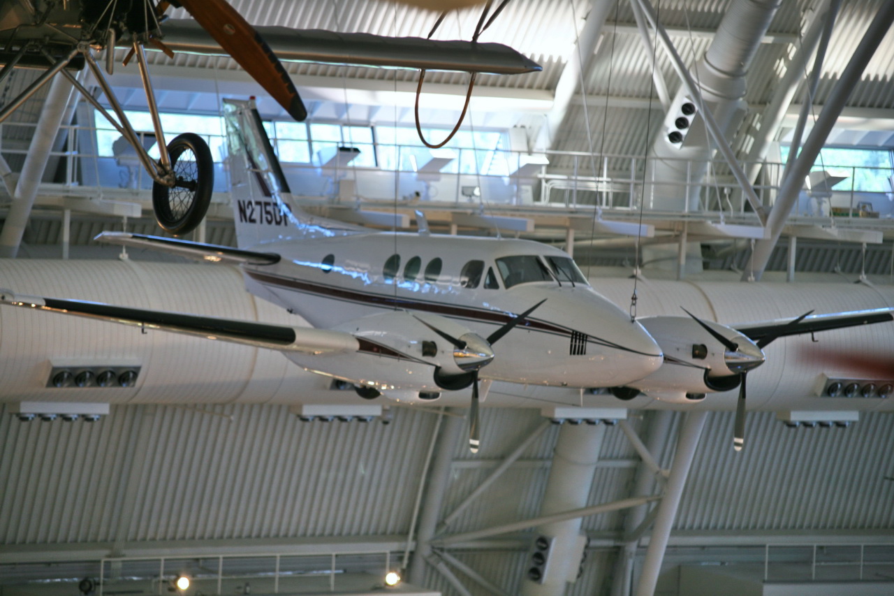 a small airplane hanging from the ceiling inside