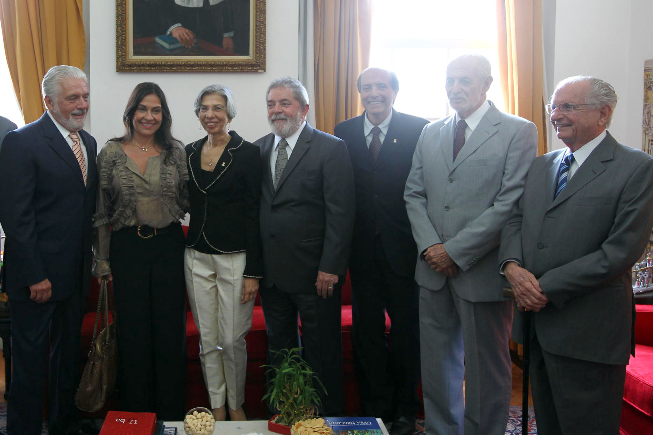 a group of people standing together in an office