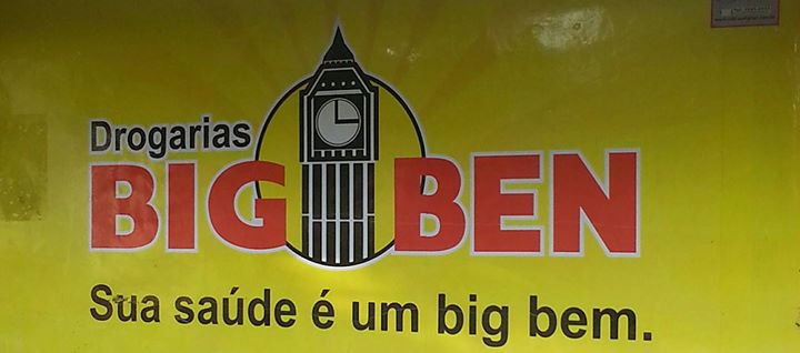 big ben sign on the side of a building