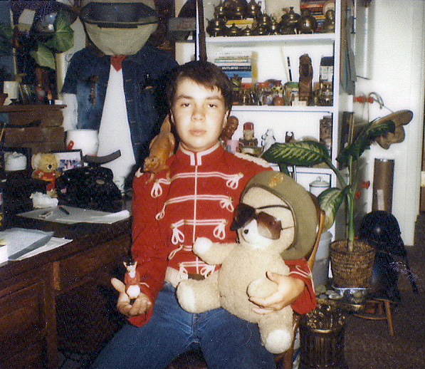 the child in the room is holding a large stuffed animal