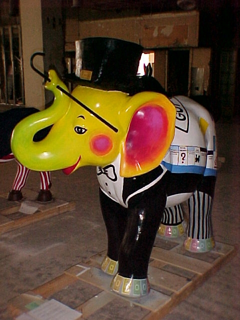 a balloon is displayed on top of a sculpture