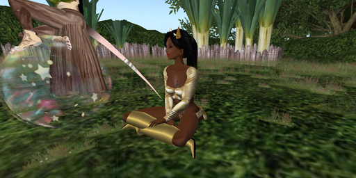 a woman in a costume sitting on the grass
