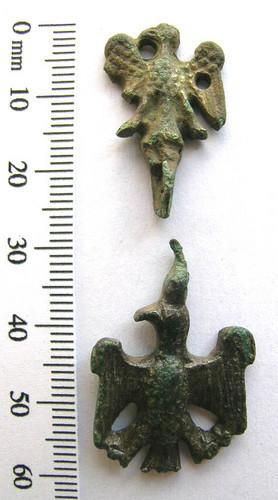 three antique bronze ornaments from the middle 14th century ad