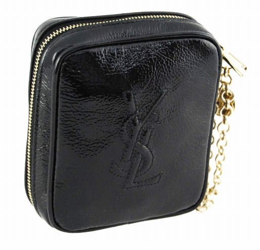 a black handbag with gold chains is shown