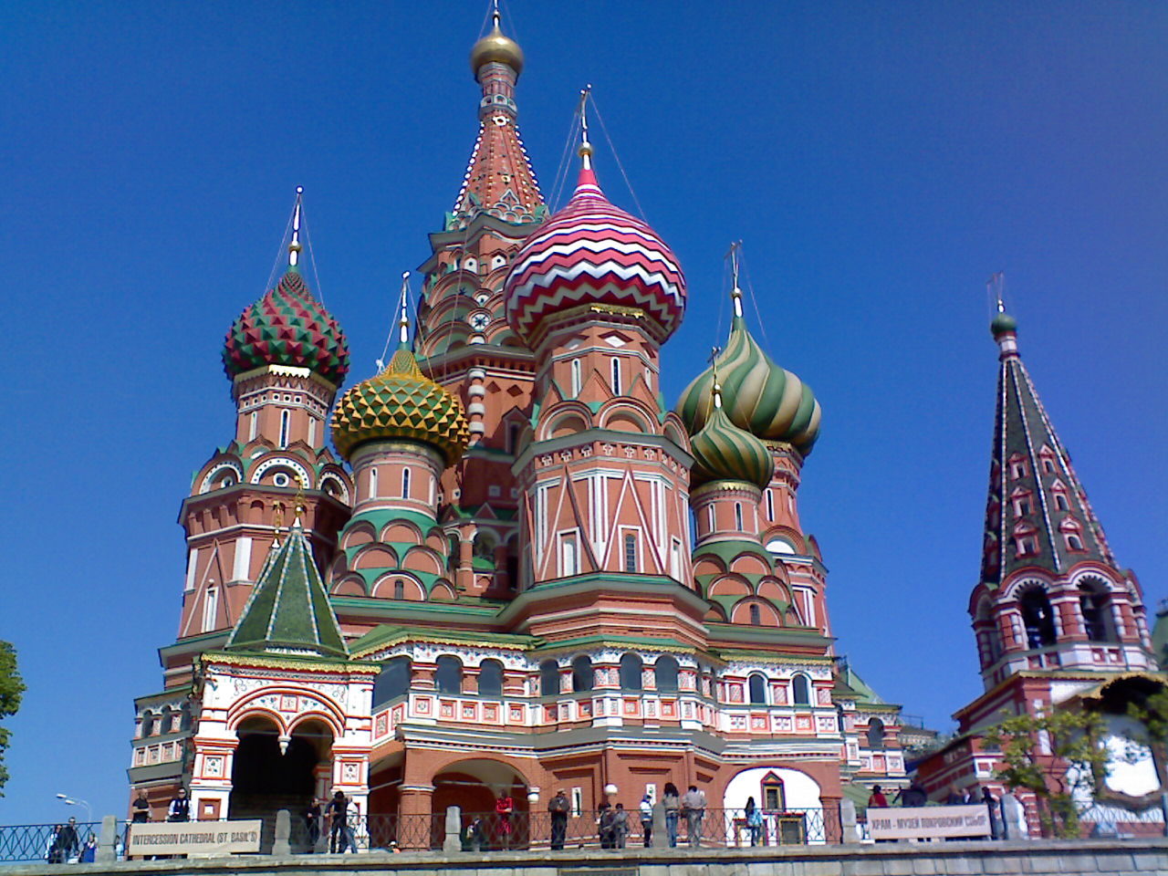 some very pretty buildings with huge towers in the background