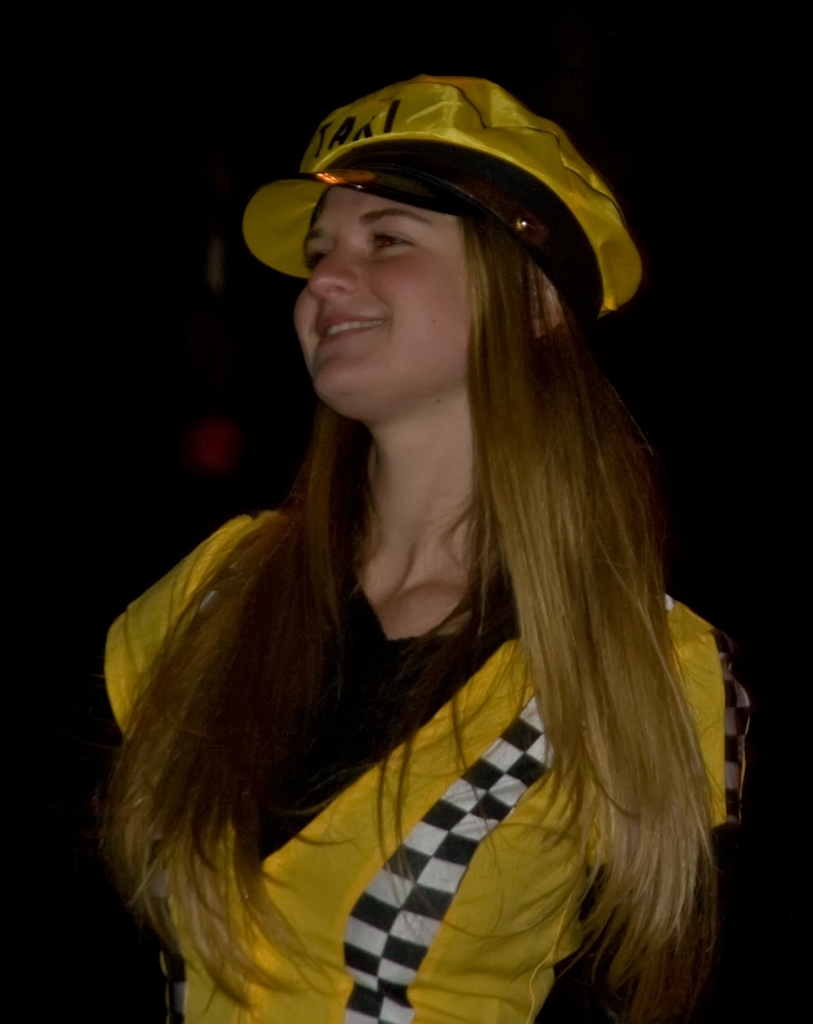 a woman wearing a yellow hat and shirt