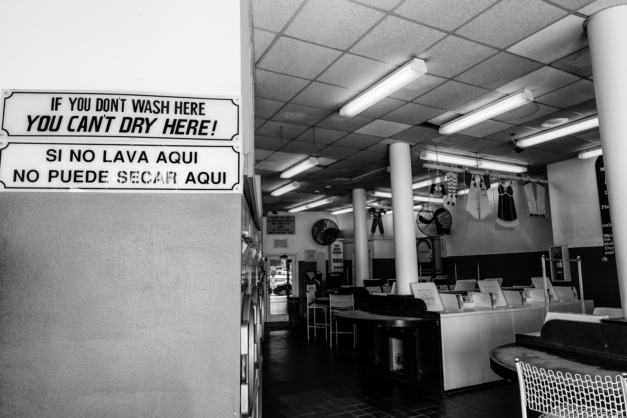 black and white image of a washroom with no paper or laundry items