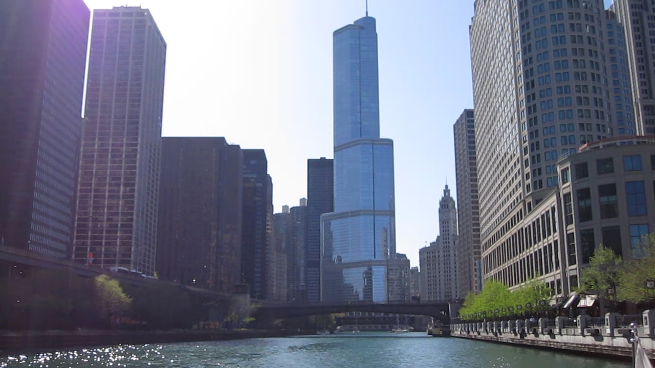 a river running through a city with tall buildings