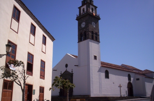 a large church building with a clock tower
