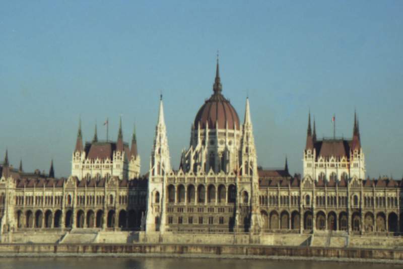 the big building has several spires and towers