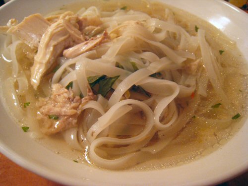 a bowl of food that is sitting on a table