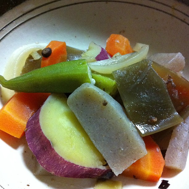 a plate topped with various vegetables of different colors