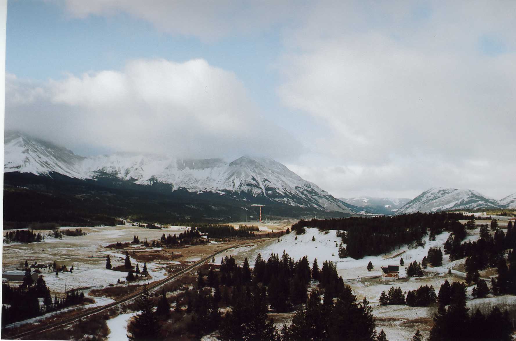 a landscape pograph with a mountain range behind it