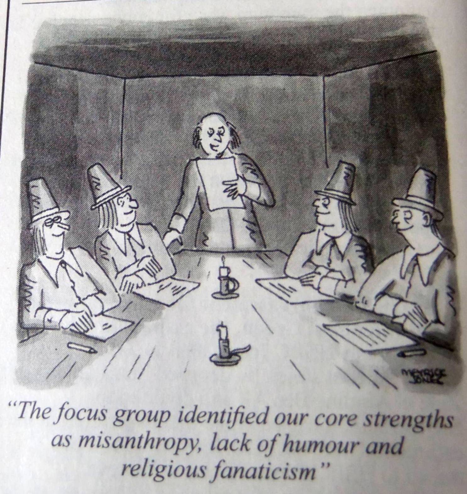 a book opened to a cartoon of a group sitting around a table