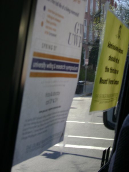 a poster on a bus window with a sign reading get it free
