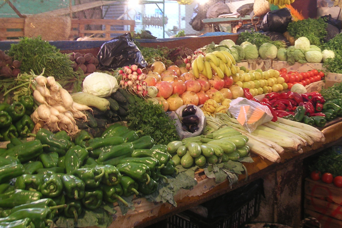 vegetables are on display in a market for sale