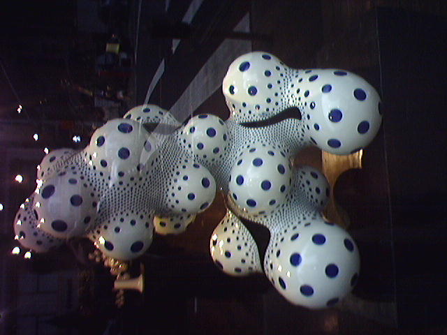 a group of polka dots hanging from the ceiling