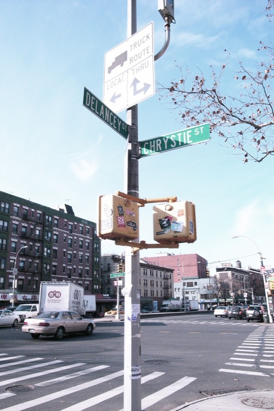 there are many street signs on this pole